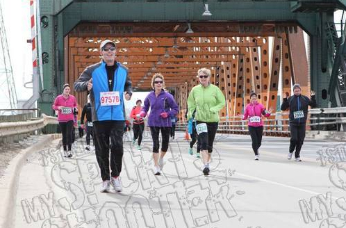 running across the bridge