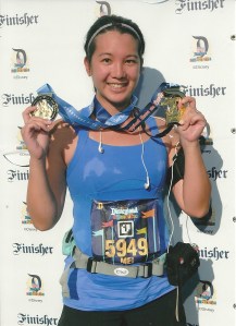 holding two new medals