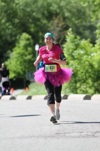 Mei running in a tutu at the Toronto Women's Half Marathon.