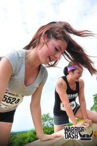 Me and another girl climb over the wall at the top.