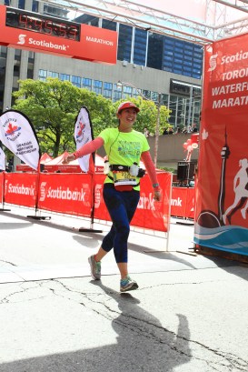 Mei finishing the marathon.