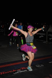 Mei crossing the finish line of the 5k.